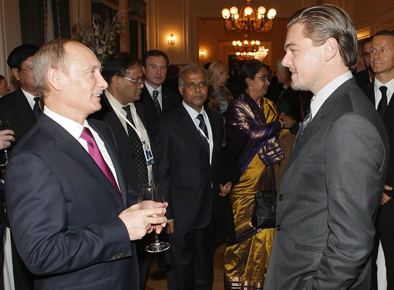 Леонардо Ди Каприо с Владимиром Путиным на конференции по защите амурских тигров